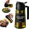A dark green glass bottle of extra virgin olive oil with a pump dispenser and a spigot, shown next to a hand pouring oil.
