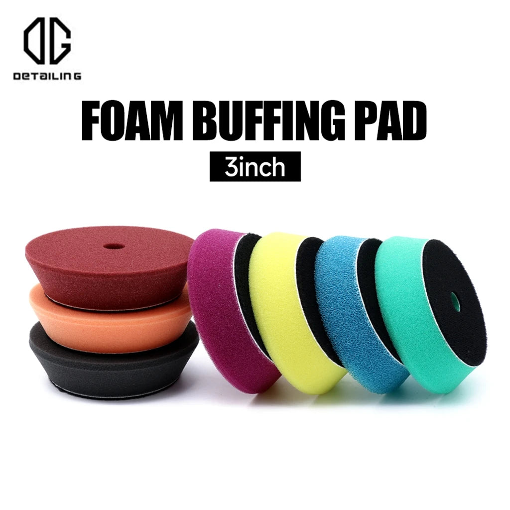A set of foam buffing pads in various colors including red, purple, yellow, black, blue, and green for car detailing.