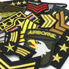 A collection of tactical embroidered patches featuring military rank insignia and emblems.