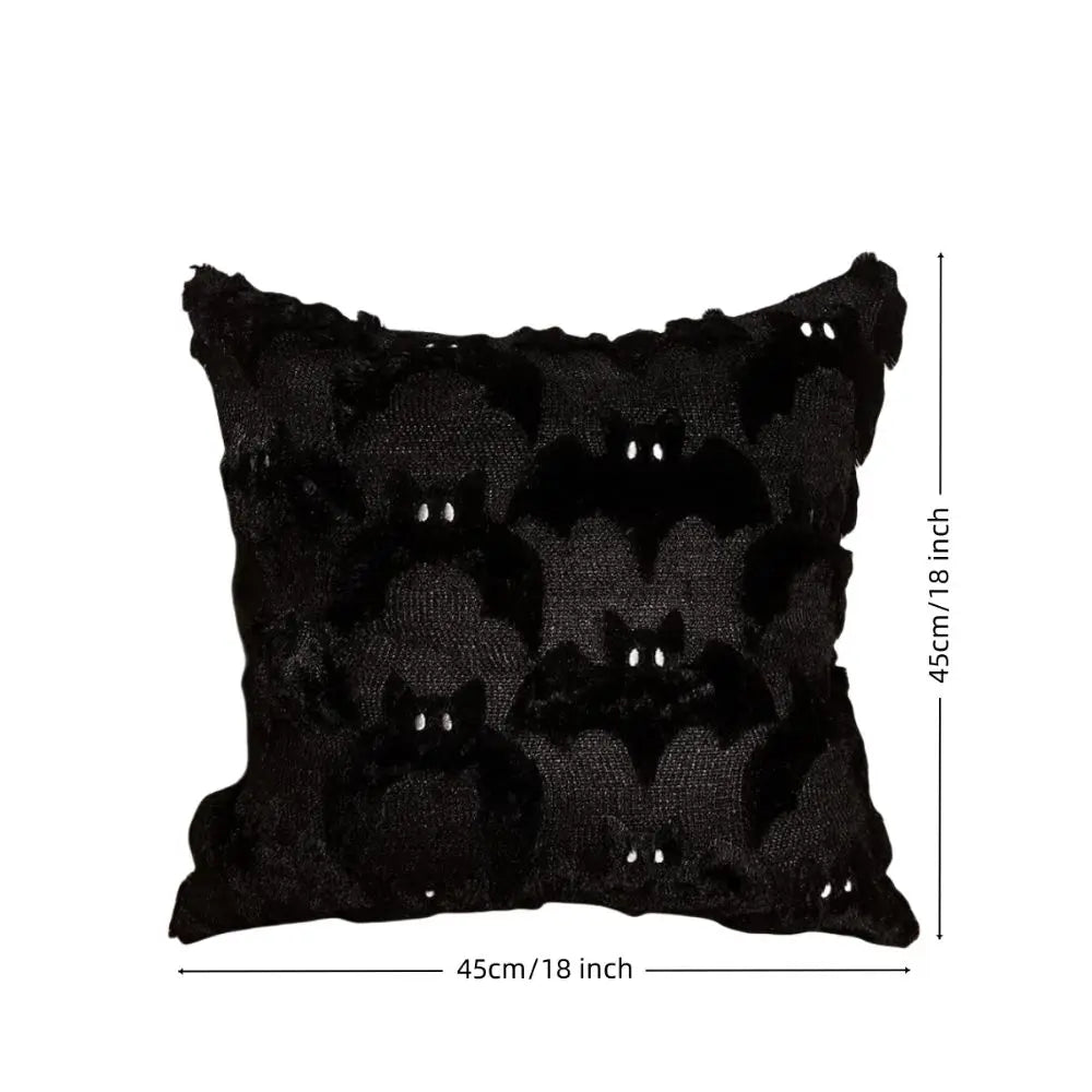 Black throw pillow cover featuring a pattern of Halloween ghosts and pumpkins