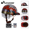 A black motorcycle helmet with a red and silver leaf design, shown with an attached baseball cap visor and accessories.