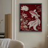 A framed painting featuring a white pearl design on a deep red background, suitable for wall decor.