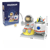 A set of Luminous Astronaut Moon micro building blocks featuring an astronaut and various colored pencils.
