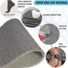 Roll of gray non-slip bathroom floor mat material showing texture and thickness