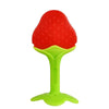 A red silicone baby teether shaped like a strawberry with a green base.