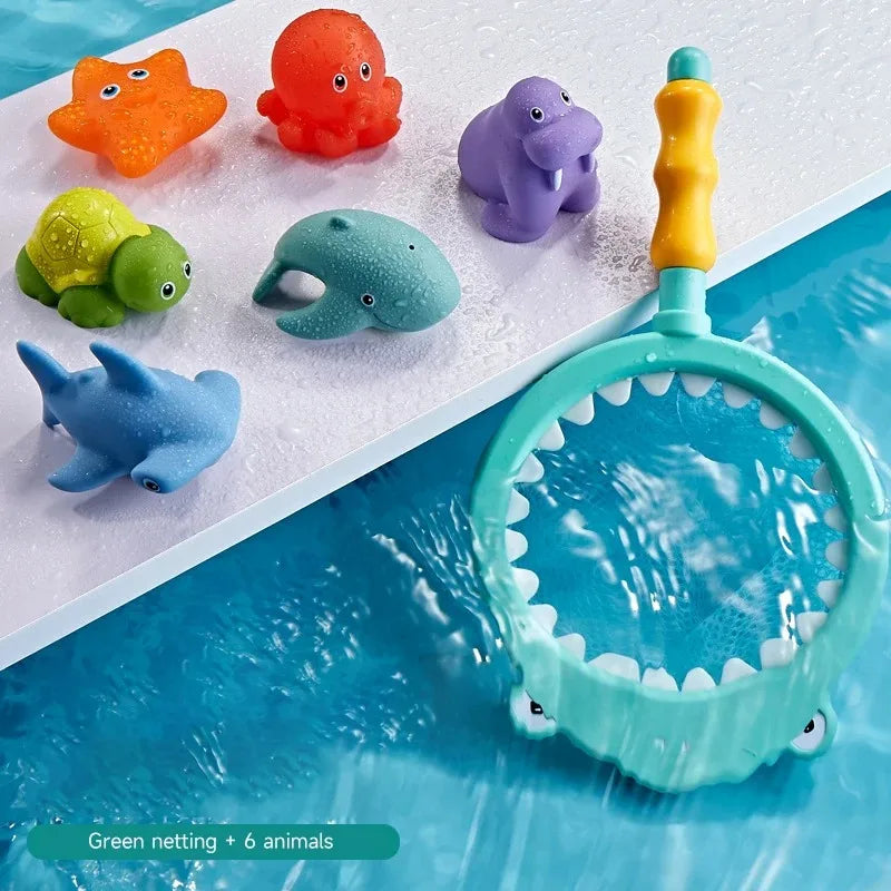 A set of six colorful animal bath toys, including a yellow fox, red bird, purple elephant, green turtle, blue shark, and a ye