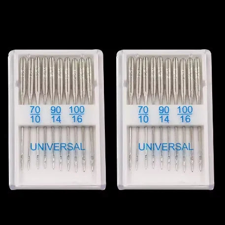 A pair of stainless steel sewing machine needles packaged in a clear plastic case with numbered sets for universal use.
