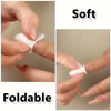 Close-up of soft and foldable lint-free cotton rounds being used for nail care.