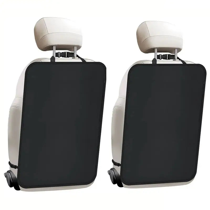 A pair of beige waterproof car seat back kick protectors shown against a white background.