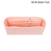 A pink felt bag organizer with multiple internal pockets and a silver zipper.