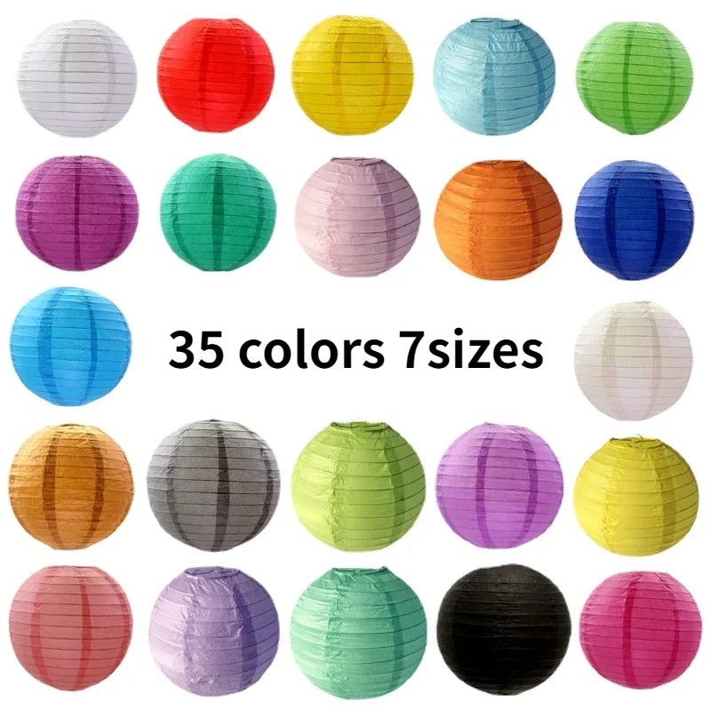 A collection of 35 round paper lanterns in various colors and sizes.