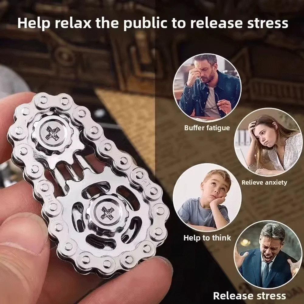 A hand holds a silver sprocket fidget spinner designed to help relax the public and relieve stress.