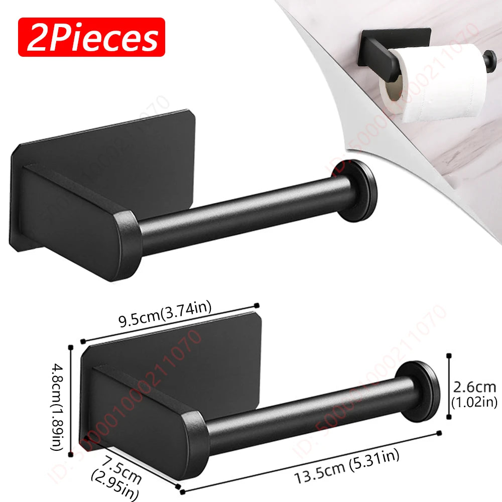 A black adhesive stainless steel toilet paper rack shown in two pieces, featuring a horizontal bar and mounting bracket.