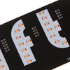 A black circuit board with multiple LED lights mounted on it.