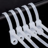 A row of clear, reusable screw-hole cable ties with mounting holes arranged horizontally.