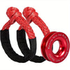 Red synthetic winch rope with black shackle and recovery ring components