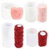 Various pink and red rose-shaped pillar candles made from silicone molds for DIY crafting