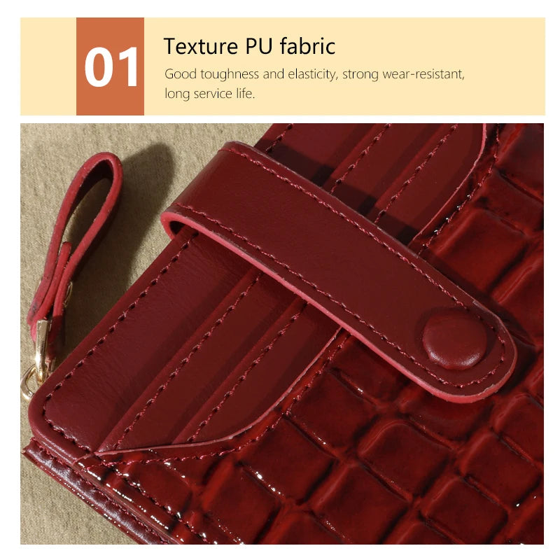 A close-up of a maroon PU fabric wallet showing its textured surface and stitching.
