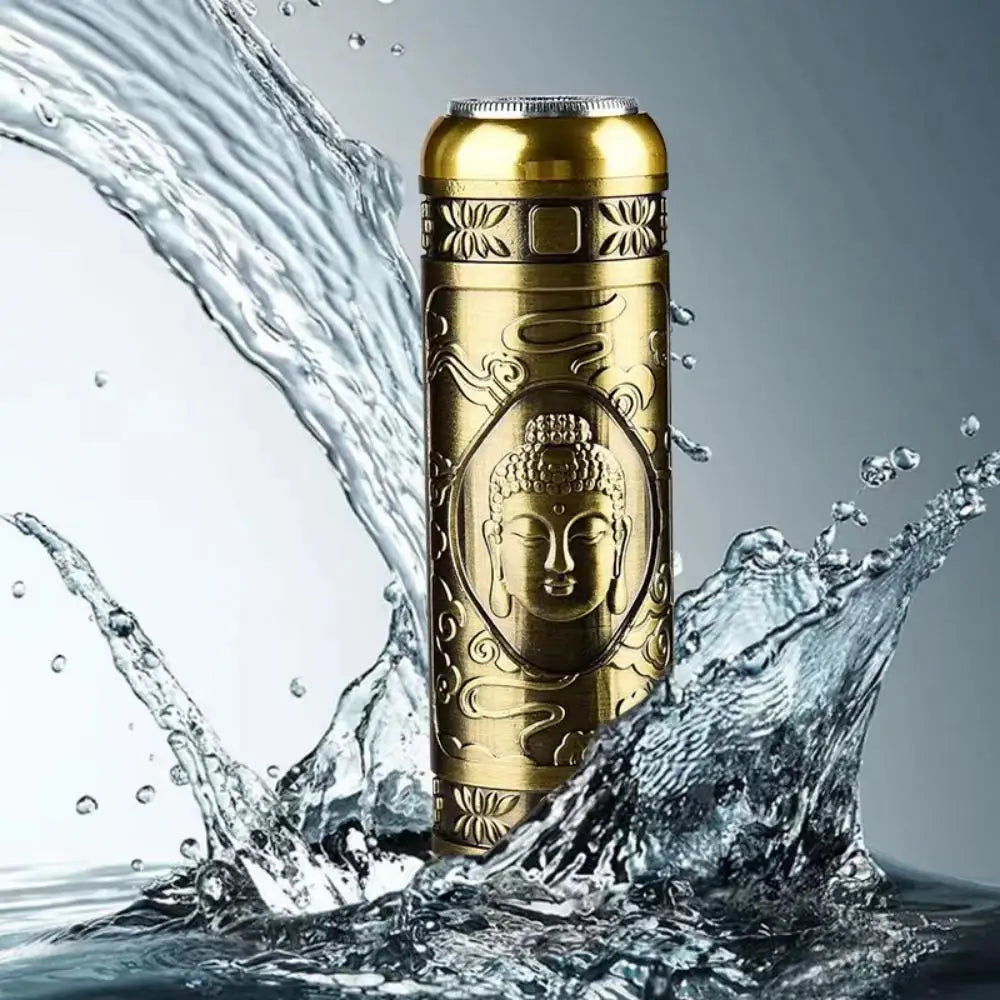 A gold-colored mini electric razor is shown splashing water in a dynamic shot.