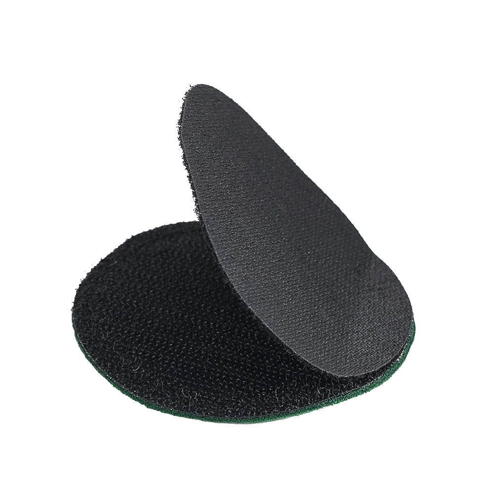 Black tactical patch with hook and loop backing shown from the side.