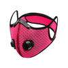 A bright pink reusable dust mask with black accents and a mesh filter.