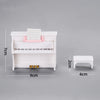 A white fashion doll accessories set featuring a piano-like structure and a small stool.