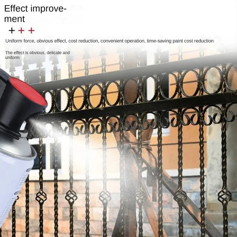 A close-up of a spray paint handle applying paint to a decorative metal fence.