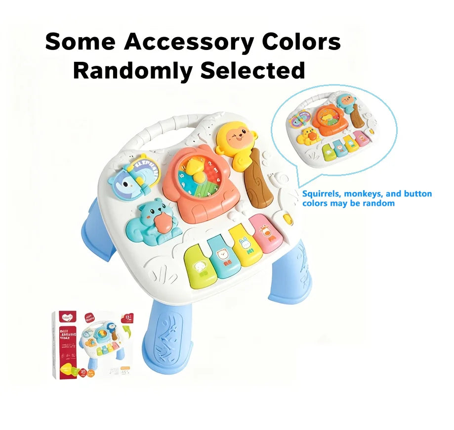 A white interactive baby learning table with colorful buttons and animal figures, showing randomly selected accessory colors.