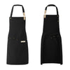 Black waterproof canvas chef apron with wooden toggles