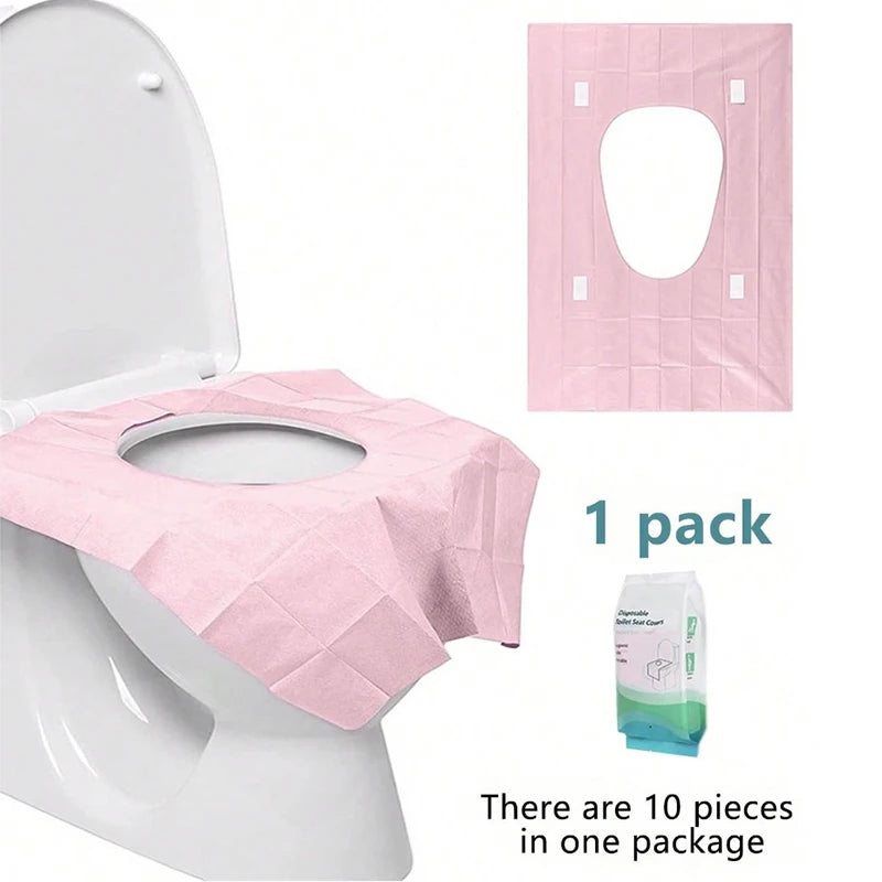 A pink disposable toilet seat cover is shown on a white toilet, with a package of ten pieces visible.