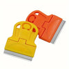 An orange and yellow compact multi-purpose scraper tool used for removing stickers, glue, and paint.
