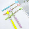 A set of five colorful retractable teacher pointers with various colored tips displayed on a white background.
