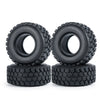 Two black rubber mud terrain tires stacked on top of each other
