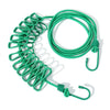 Green elastic travel clothesline with non-slip clips coiled on a white background