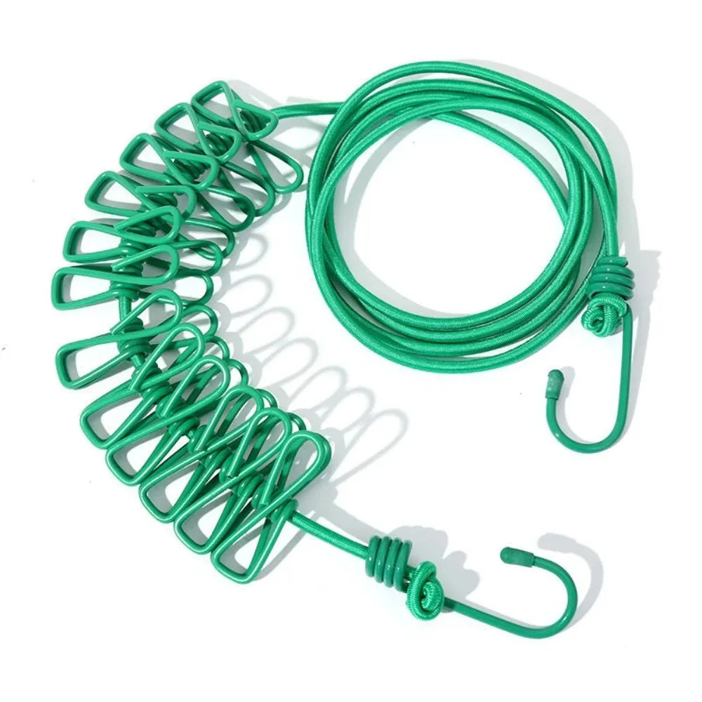 Green elastic travel clothesline with non-slip clips coiled on a white background