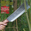 A close-up of a super-thick manganese steel knife with a wooden handle, shown outdoors.