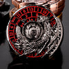 A close-up of a premium metal spinner dice cube featuring a red and black numbered face and an eagle design.