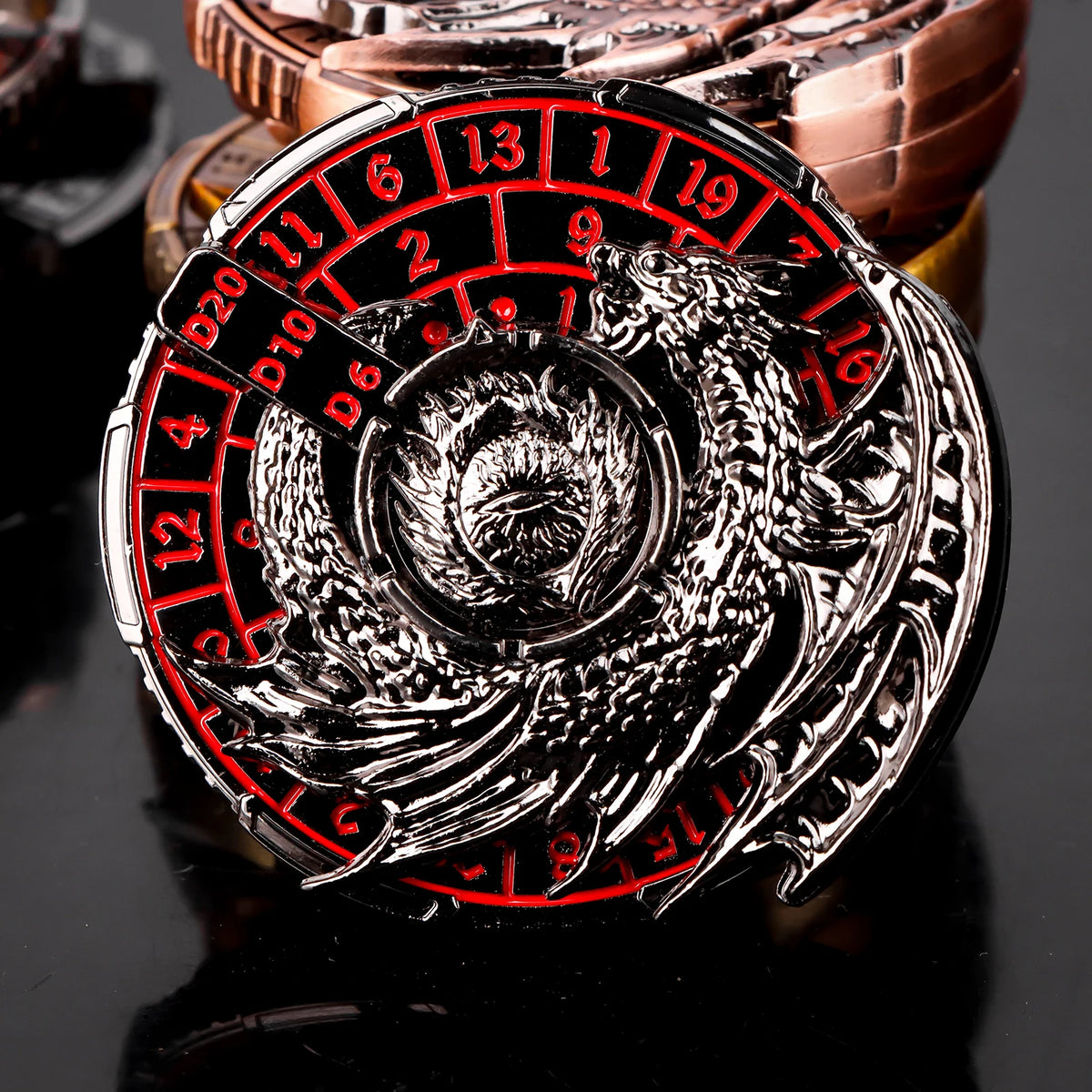 A close-up of a premium metal spinner dice cube featuring a red and black numbered face and an eagle design.