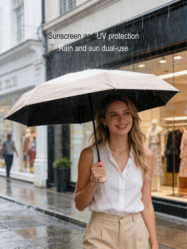 A woman holding a beige umbrella in the rain, demonstrating its dual use for sun and rain protection.