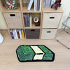 A green and yellow cartoon dollar bill tufted non-slip mat displayed on a wooden shelf with various storage baskets.