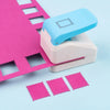 A light blue postage stamp embossing punch is shown next to a pink sheet of paper and several pink stamps.