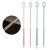 A set of two reusable silicone straw cleaning brushes, one pink and one blue-gray, shown alongside a magnified view of the br