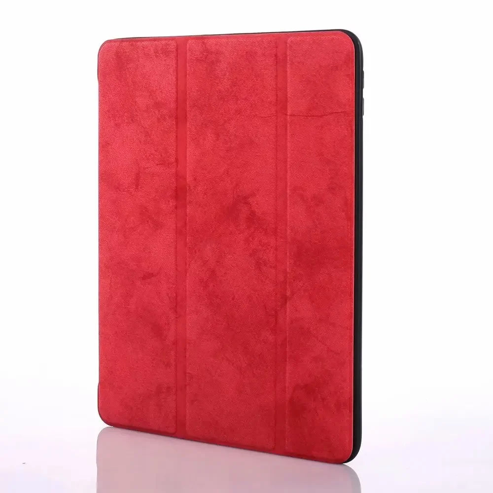 A red Retro Marble iPad Pro 12.9 case with a built-in pencil holder.