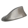 A gray shark fin car antenna with FM/AM signal enhancement.