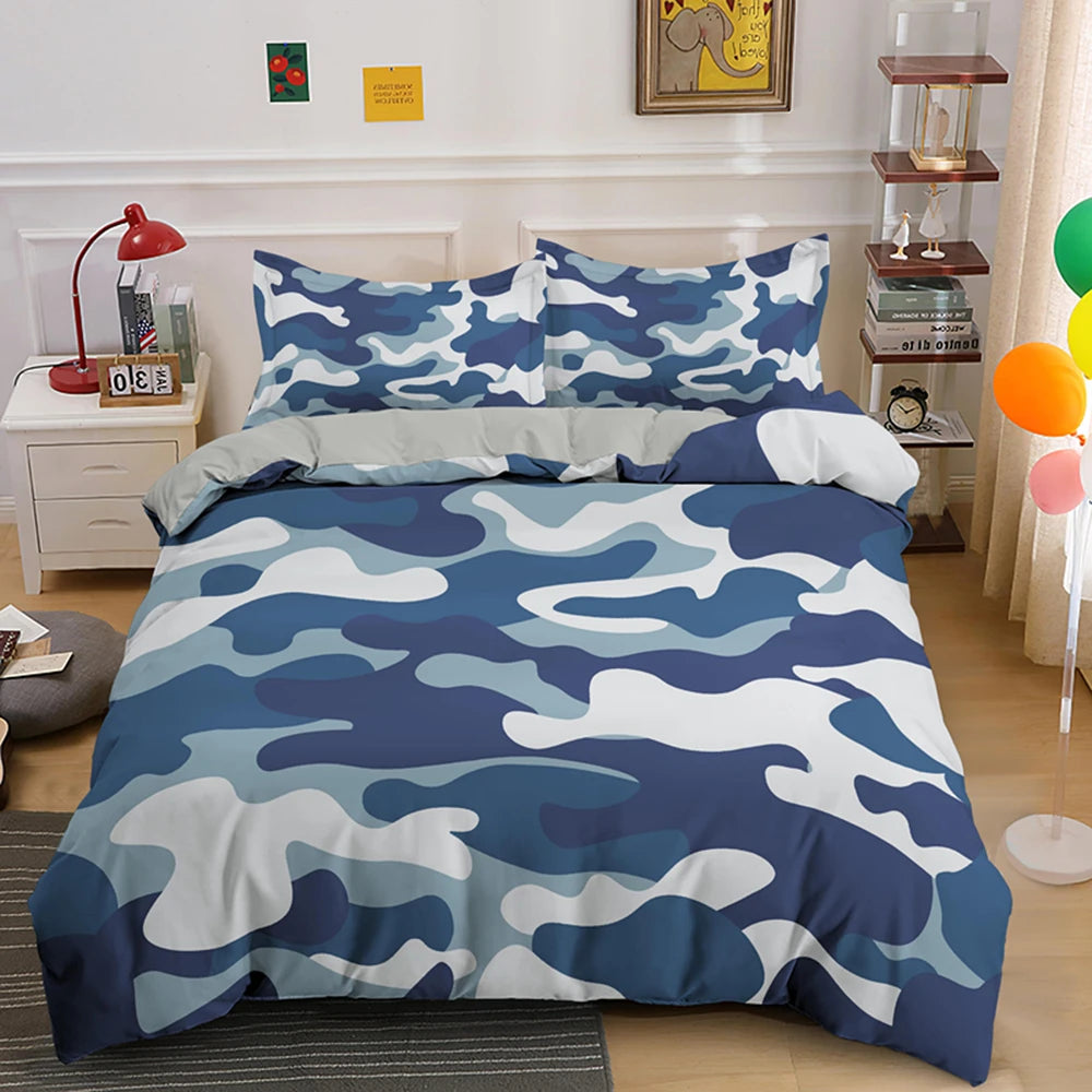 A blue and white camouflage duvet cover set displayed on a bed with surrounding bedroom decor.