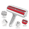 A white pet hair remover tool with red bristles and a hanging hole, showing various features.