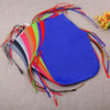 A colorful pack of 30 non-woven fabric craft aprons in various bright colors laid out on a beige background.