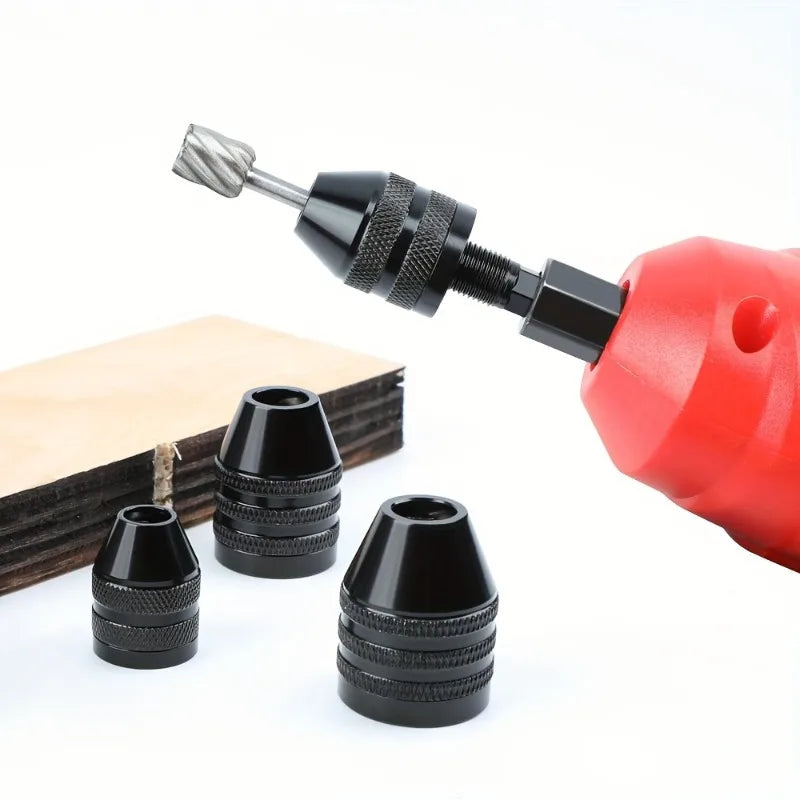 A red quick-change hex shank drill chuck with a round handle and several interchangeable drill bits.