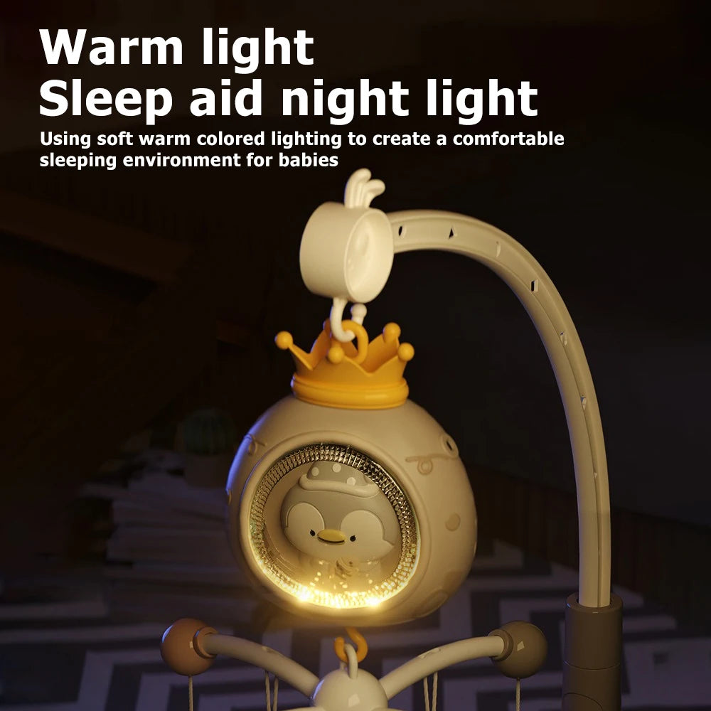 A warm light night light lamp with a crown-shaped head is shown illuminating a baby crib environment.