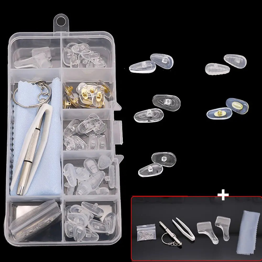 A clear plastic kit containing various glasses repair components including nose pads, screws, and precision tools.